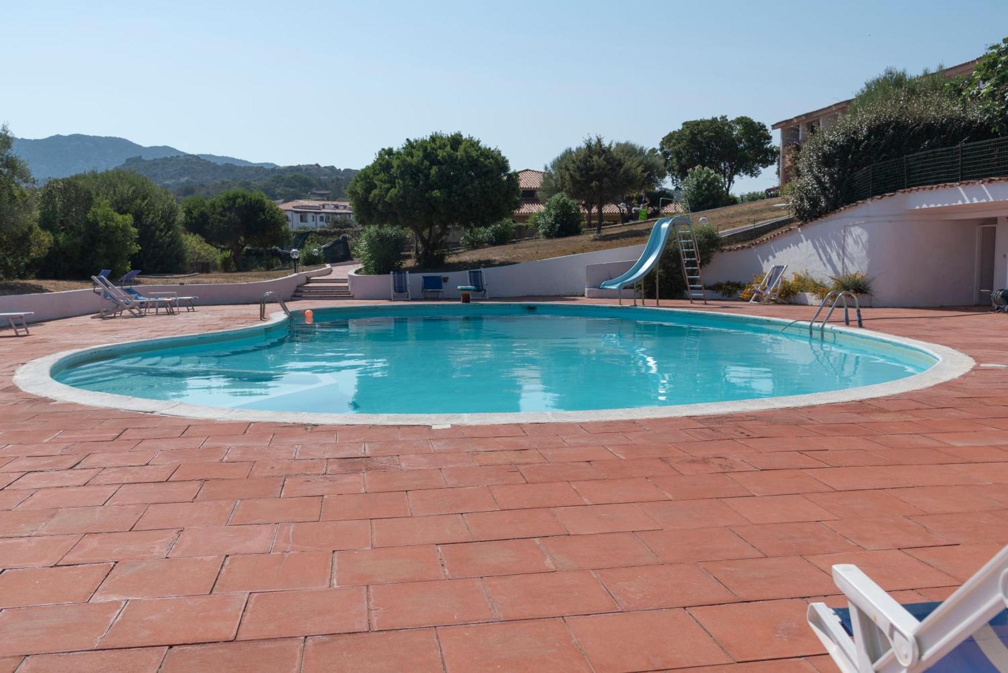 Appartamento Trilocale Vista Piscina Baja Sardinia Eksteriør billede