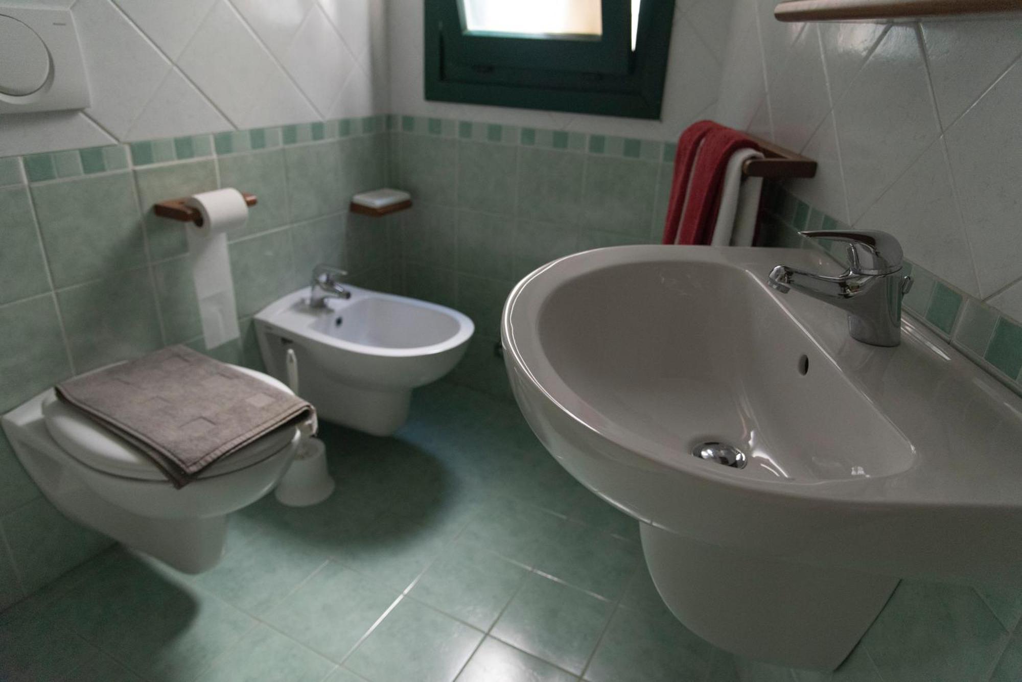 Appartamento Trilocale Vista Piscina Baja Sardinia Eksteriør billede